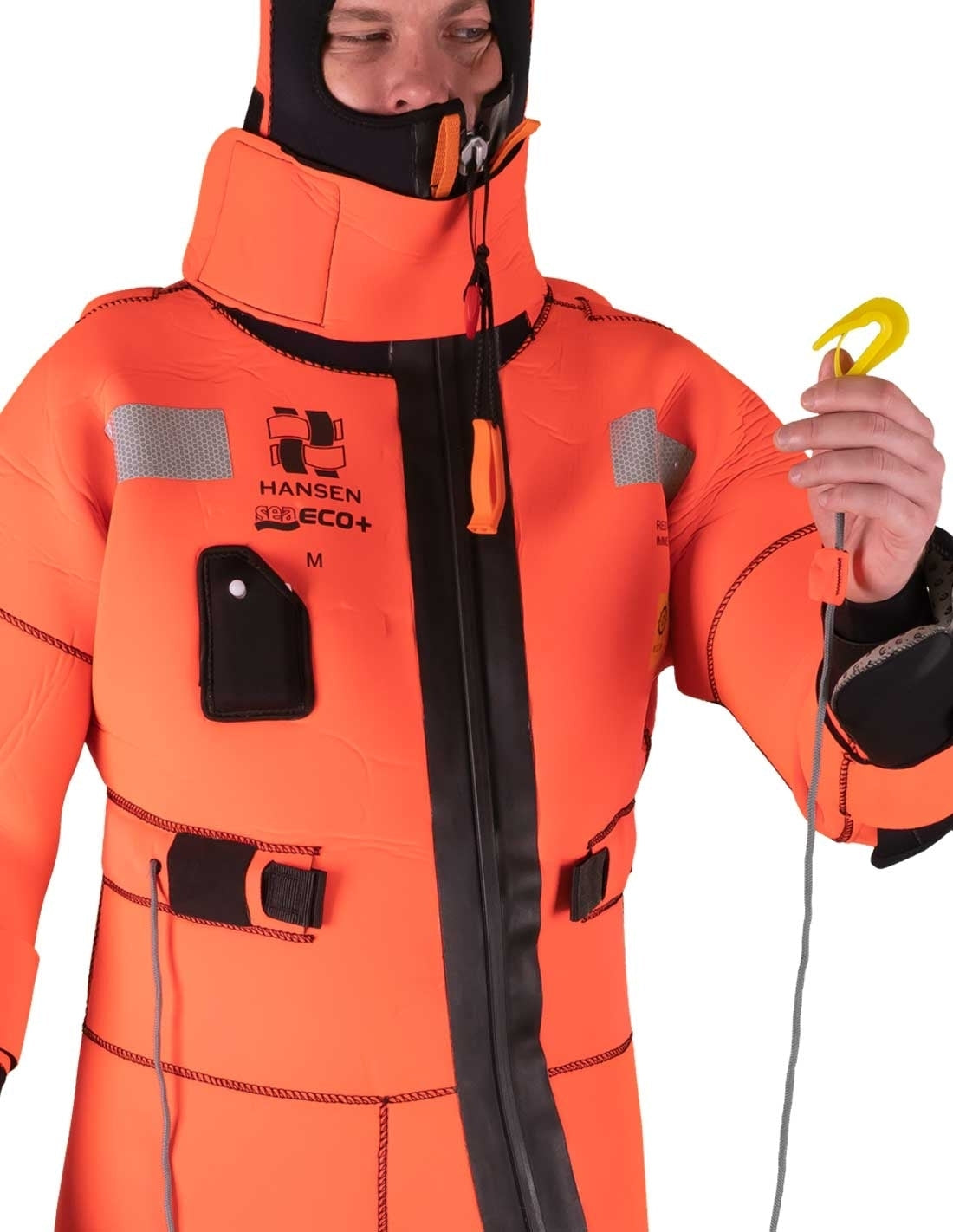 Hansen Protection SeaEco+ Solas Immersion Suit 82608– SeaEco+ is a further development of our SeaEco immersion suit. The major difference is that this suit is certified for use without a lifejacket. Built-in buoyancy in the collar ensures proper a floating position and adequate freeboard. Vacuum packing saves space and extends the mandatory service interval, which in turn makes this suit excellent value. – Now available at MTN Shop EU. - imagen 6