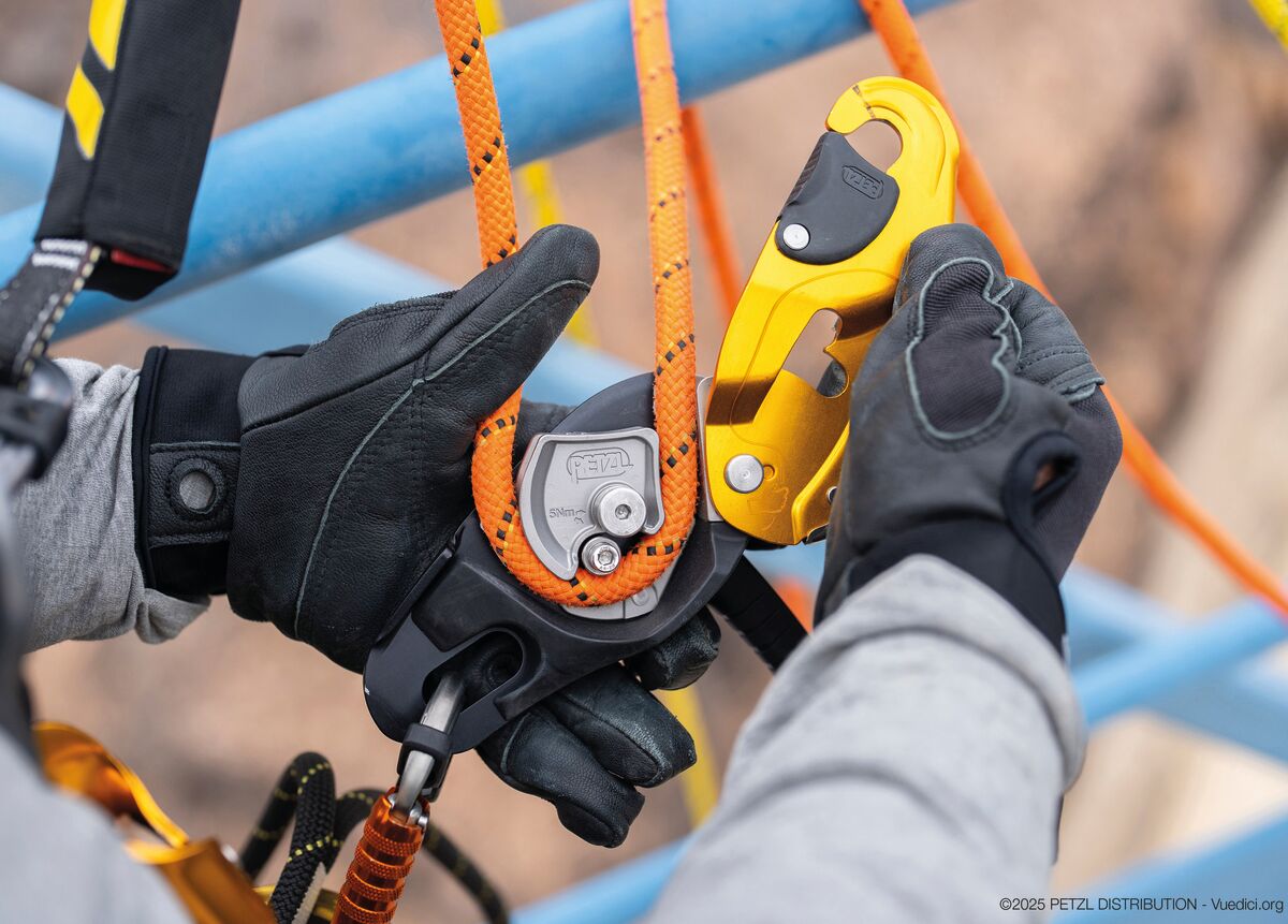 Fall protection equipment in use: rope grab, carabiner and gloves at MTN Shop EU