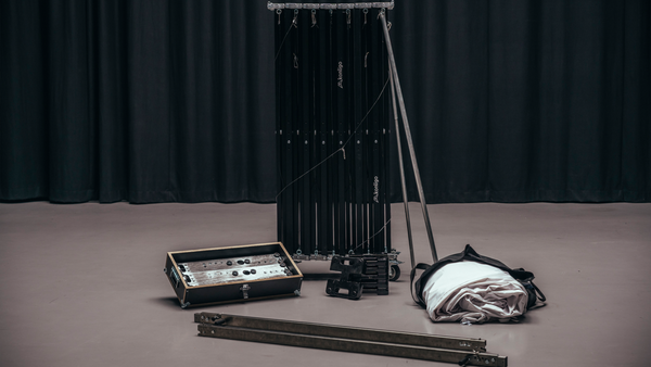 Konligo Fastival event structure components neatly arranged before assembly, including frame, fabric, and transport case, now available on MTN Shop US.