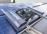 Solar panel cleaning robot on a solar panel