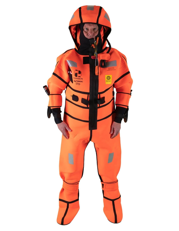 Hansen Protection SeaNordic Wet Suit 82606– A 6-hour immersion suit produced in extra strong flame-retardant neoprene. SeaNordic is equipped with an emergency light and has an integrated sprayhood that protects the face from waves and possibly seabirds. The hood has an innovative inflatable bladder for improved water tightness of the face seals, improved floatation and freeboard. The suit is certified for use without a lifejacket and is perfect as a survival suit on board fishing vessels, merchant ships and